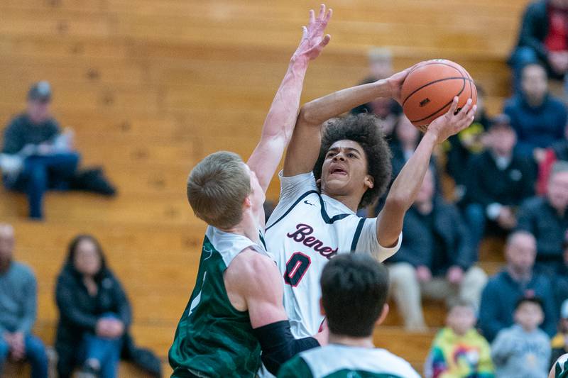 Benet’s Brayden Fagbemi (0) shoots the ball in the paint against Bartlett's Martin McCarthy (1) during the 4A Addison Trail Regional final at Addison Trail High School in Addison on Friday, Feb 24, 2023.