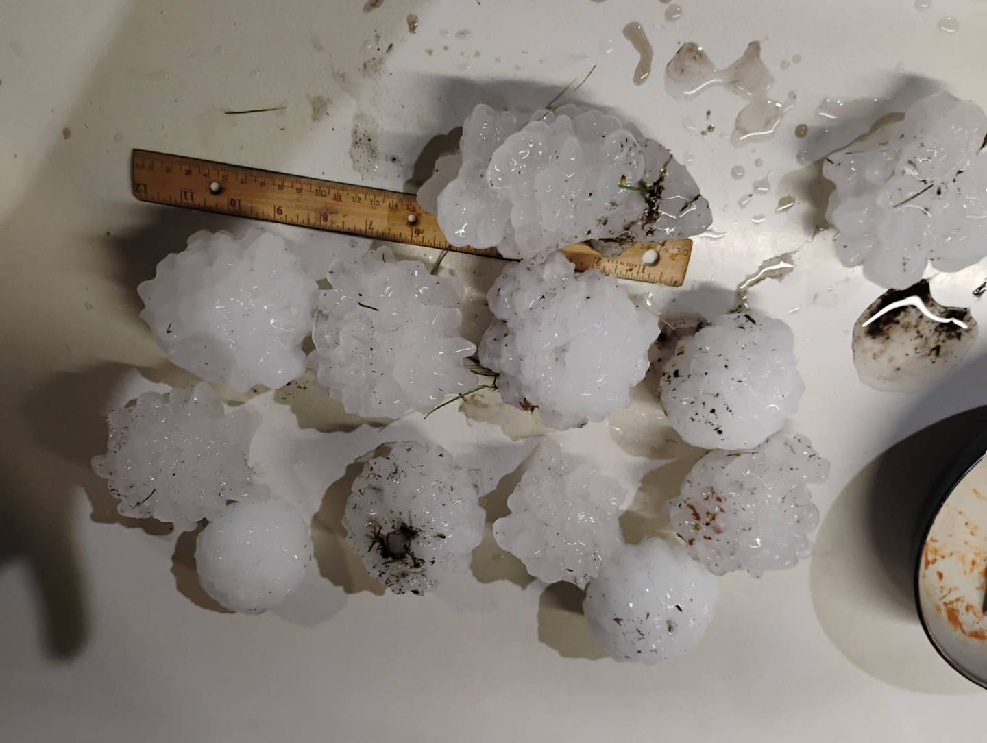 An approximately 6.5 inch piece of hail with many other sizable pieces that fell in Kankakee on Tuesday, March 10, 2026.