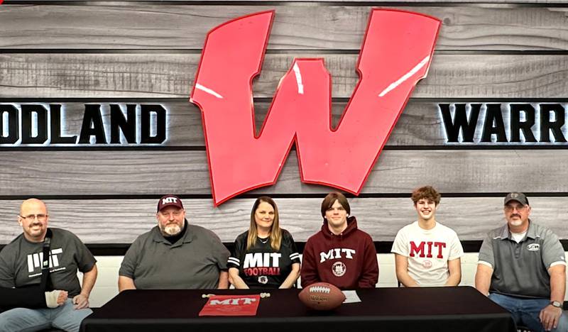 Recent Woodland graduate and Times All-Area Football first-teamer Aydan Radke has selected to continue his education at the Massachusetts Institute of Technology in Cambridge, Massachusetts, and his football career at the NCAA Division III level with the Engineers. Pictured at his signing ceremony are (from left) Flanagan-Cornell/Woodland defensive coordinator Aaron Jackson, family members John Roemer, Deborah Roemer, Aydan Radke, Zander Radke and FCW head coach Todd Reed.