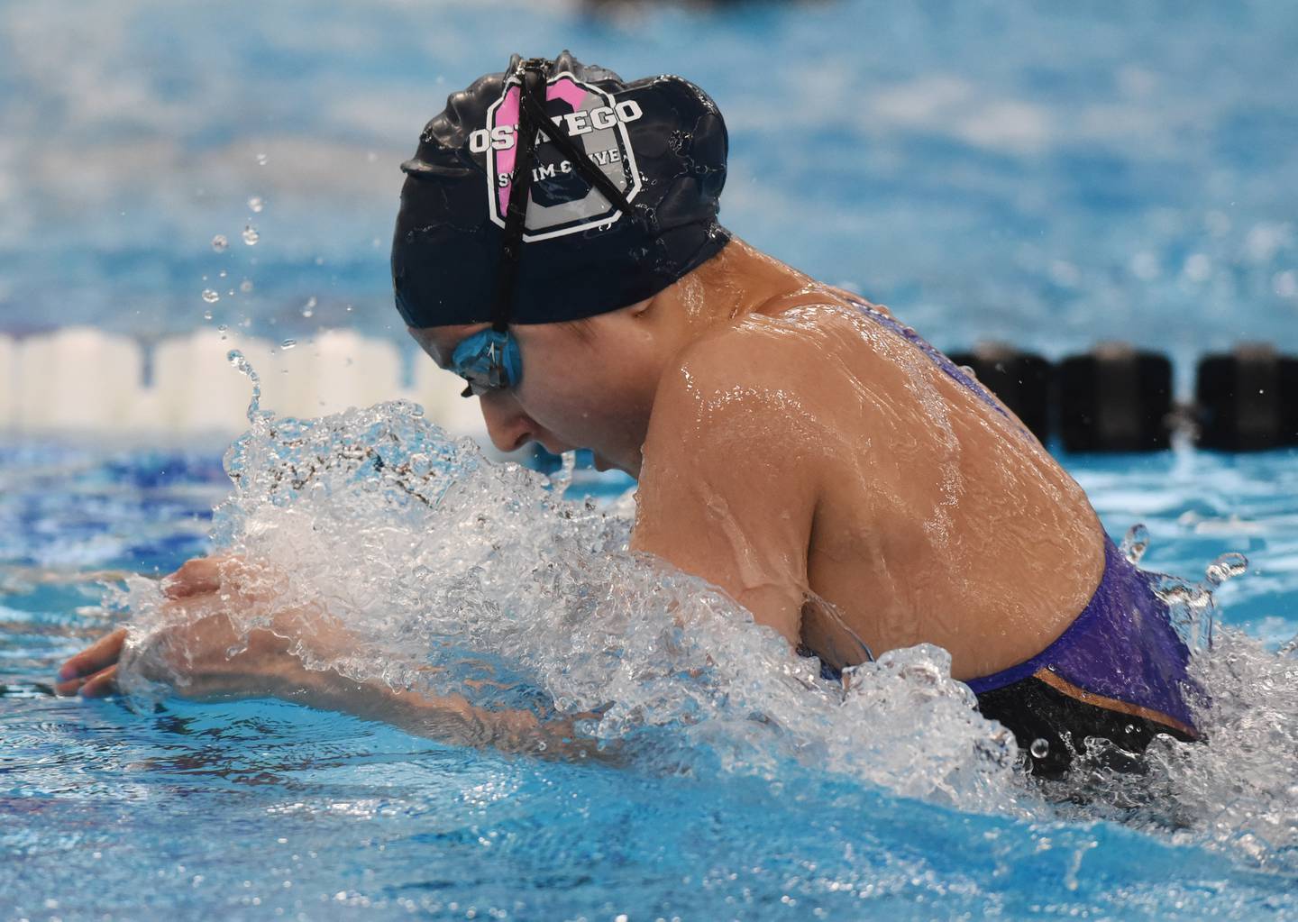 Chloe Diner of Oswego East swims breaststroke in the 200-yard individual medley during the IHSA girls state swimming finals at FMC Natatorium in Westmont on Saturday, Nov. 12, 2022.