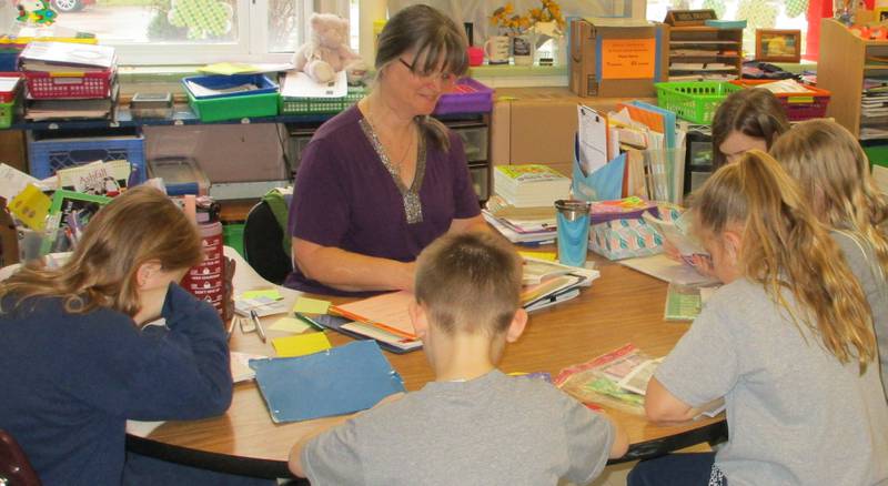 Pictured: St. Mary's second grade teacher Mrs Iwans with her students.