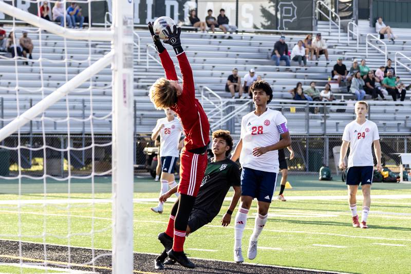 South Elgin's Mikey Nestorowicz makes a save against Plainfield Central during a game at Plainfield Central on Aug. 28, 2025.