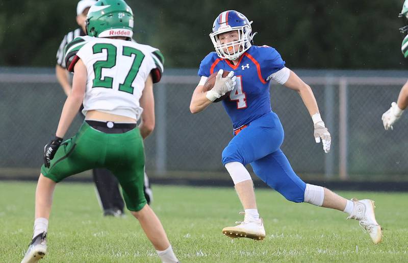 Genoa-Kingston's Ethan Wilnau carries the ball on the opening kickoff during their game against North Boone Friday, Sept. 9, 2022, at Genoa-Kingston High School.