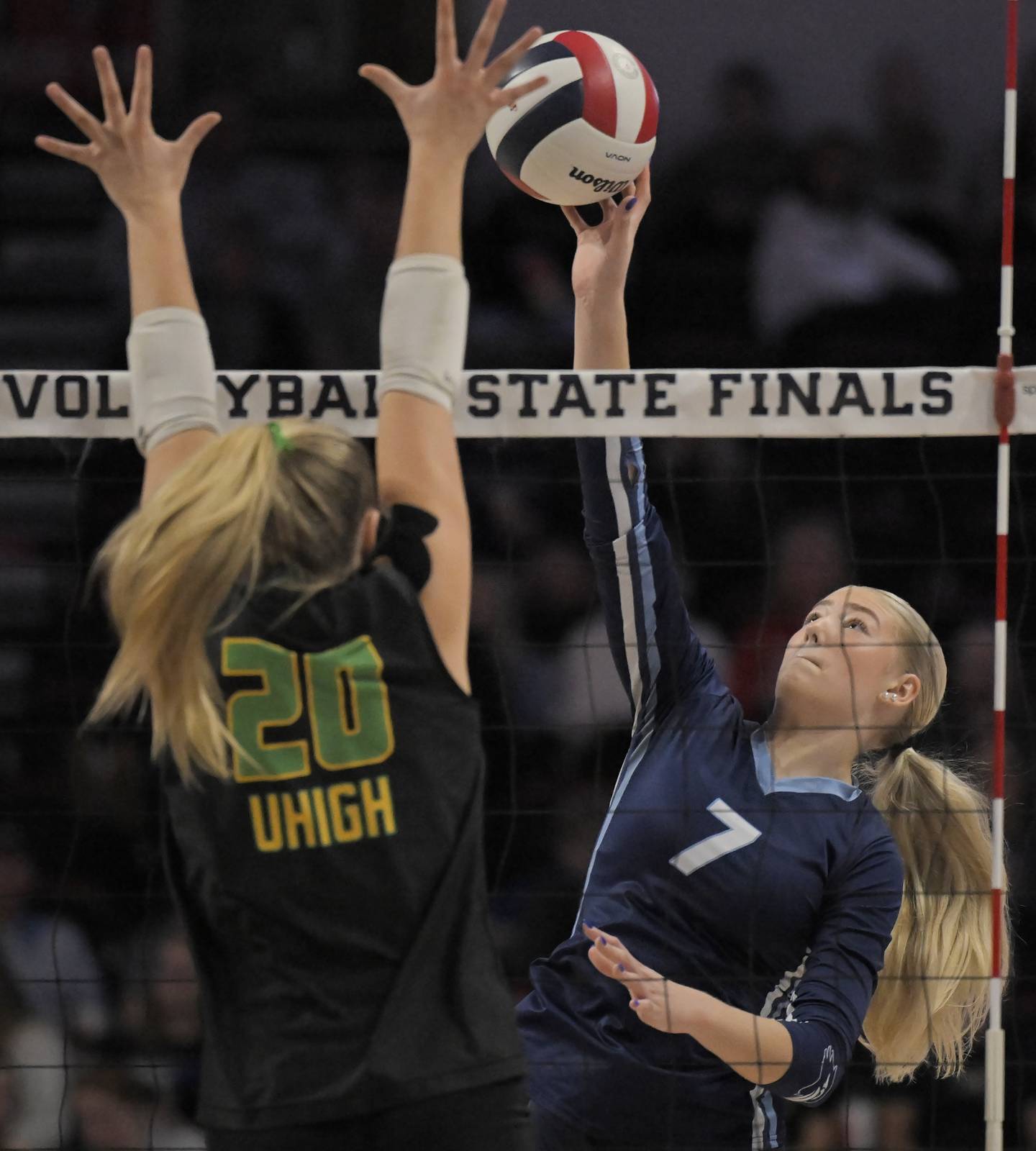 Nazareth’s Lexi Van Eekeren hits at the net against Normal U-High’s Madison Funk in the Class 3A final match at the IHSA girls volleyball state finals tournament on at Illinois State University on Saturday, Nov. 15, 2025