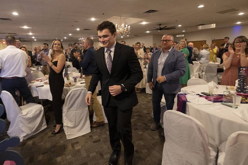Noah Grot heads to the stage to accept one of the 4 under 40 awards Friday, April 17, 2026, at the Best of Dixon celebration.