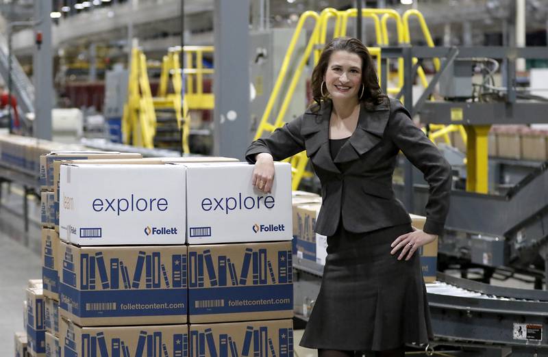 Follett Content Chief Operating Officer Britten Follett inside the warehouse of Follett Content on Tuesday, Dec. 10, 2024, She is the fifth generation of the family to leading the McHenry-based company.