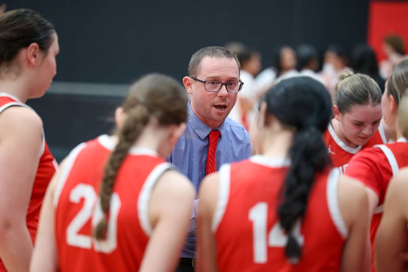 Ottawa head coach Brent Moore talks to his players in a timeout during Ottawa's 55-44 victory over Bradley-Bourbonnais' on Monday, Feb. 9, 2026.