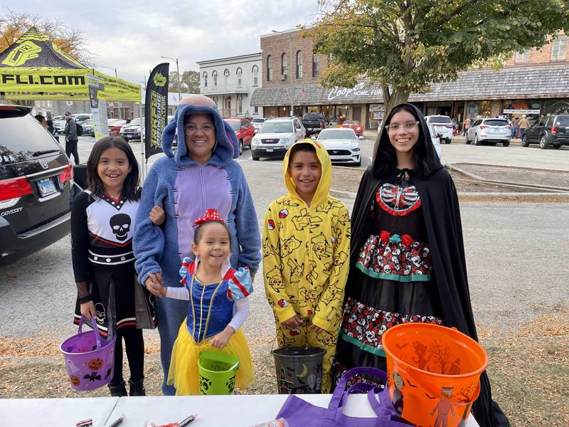 Trick-or-treaters in their Halloween costumes filled downtown Main Street in Plano for the annual "Treats in the Streets" celebration.