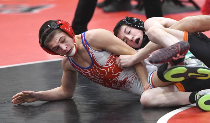 Oregon's Jordan Lowe (bottom) tries to escape from Winnebago's Cam Whitehead in the 113-pound championship at the Stillman Valley Holiday Tournament on Saturday, Dec. 20, 2025 at Stillman Valley High School.
