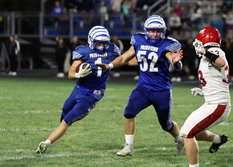 Princeton's Casey Etheridge runs behind the block of teammate Ian Morris in the Tigers' 41-0 Homecoming win over rival Hall on Friday, Oct. 4 at Bryant Field.
