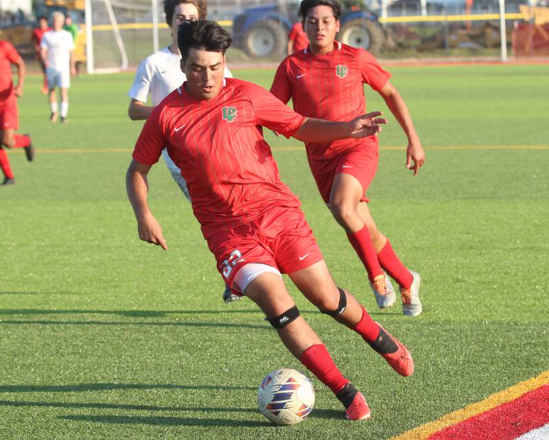 L-P's Antonio Martinez keeps the ball in bounce against Kaneland on Monday, Aug. 28, 2023 at the L-P Athletic Complex in La Salle.