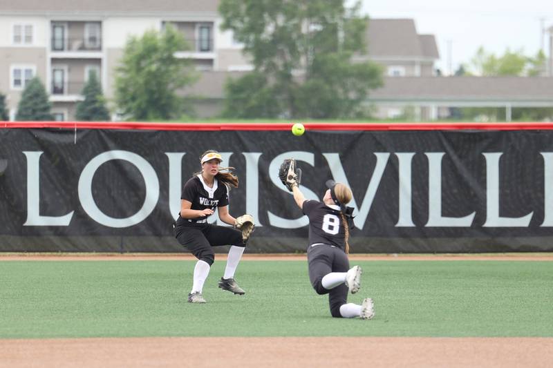Prairie Ridge's Adysen Kiddy (8) attempts a diving catch as teammate Autmn Ledgerwood arrives for backup during the Wolves' 5-0 loss to Glenwood in the IHSA Class 3A state semifinal on June 13, 2025.