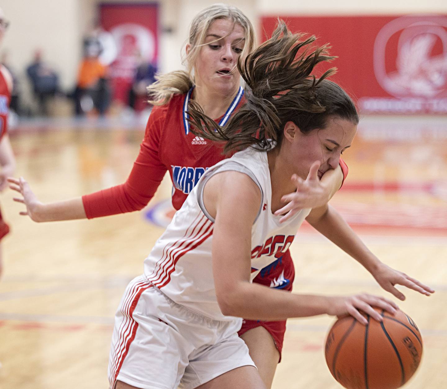 Oregon’s Sarah Eckhardt dribbles out of defense by Morrison’s Avery White Wednesday, Jan. 17, 2024 at Oregon High School.