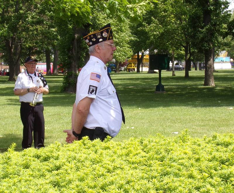 The officer of the day receives instructions from emcee Ron Sauers during the Memorial Day ceremony Monday, May 30, 2022, at Veterans Plaza in City Park in Streator.