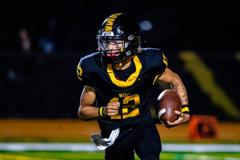 Joliet West's Alexander Cruz runs the ball During a game against Plainfield South on Friday Sept. 29, 2023 at Joliet West High School in Joliet