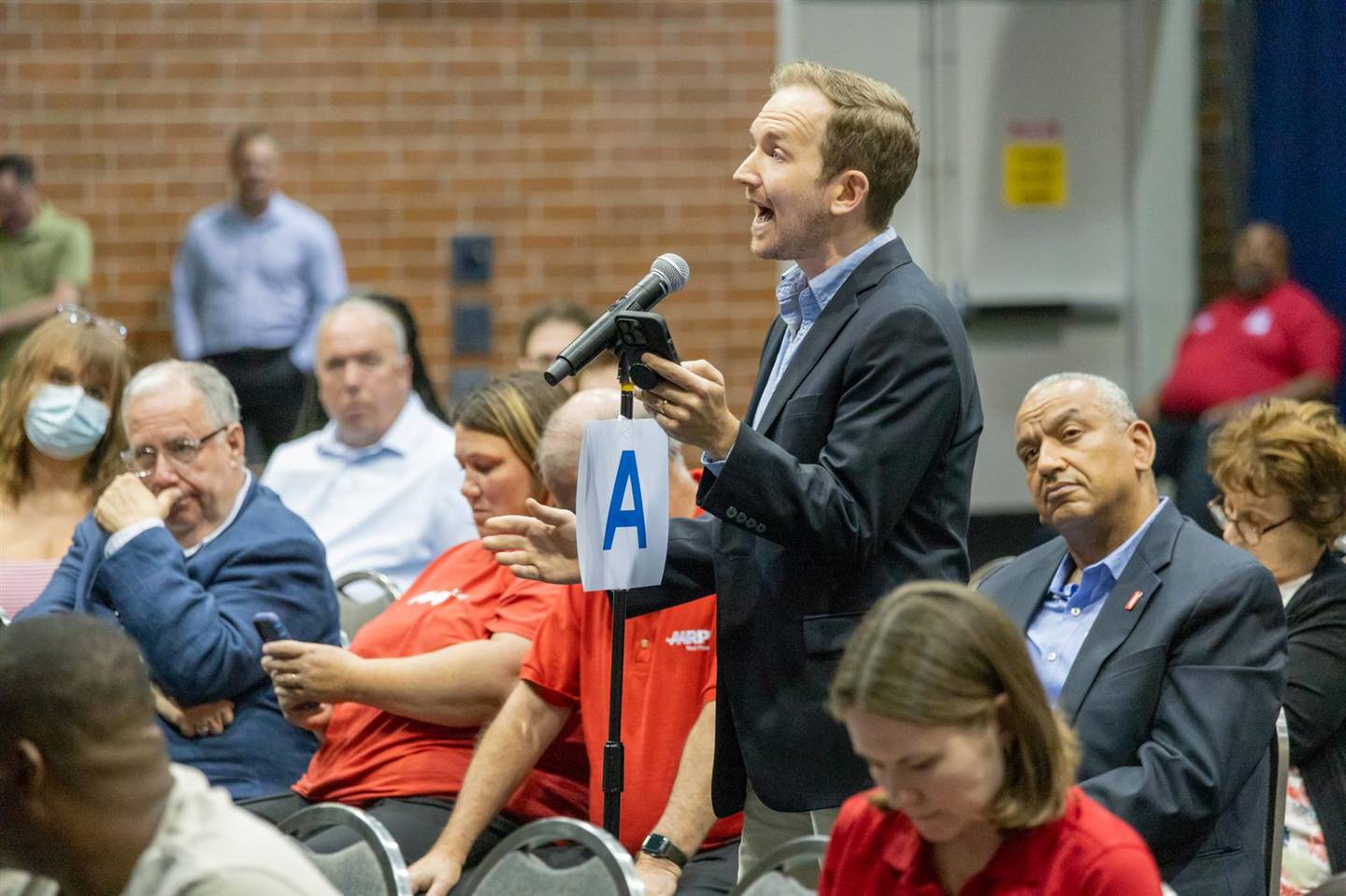 Natural Resources Defense Council advocate J.C. Kibbey calls on the Illinois Commerce Commission to rein in spending at Peoples Gas at a hearing on Tuesday, Aug. 1, 2023.
