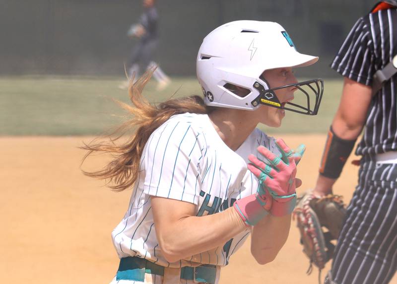 Woodstock North’s Allyson Schaid celebrates scoring against Crystal Lake Central in IHSA Class 3A Regional Title Game softball action on Saturday, May 23, 2026 at Crystal Lake Central High School in Crystal Lake.