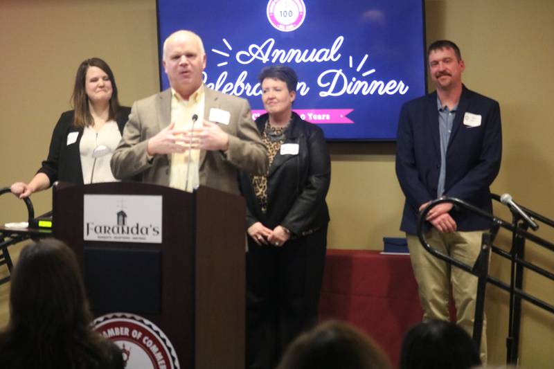 Owners and operators of Jonamac Orchard speak in acceptance of the 2024 Business of the Year award Feb. 6, 2025, at the DeKalb Chamber's annual Celebration Dinner.