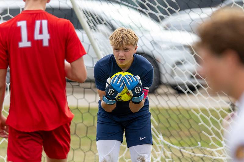 Goalkeeper Seth Zito (0) of Streator hugs ball after Mendota's failed score attempt on Saturday, Aug 30, 2025 at the James Street Recreation Area in Streator.