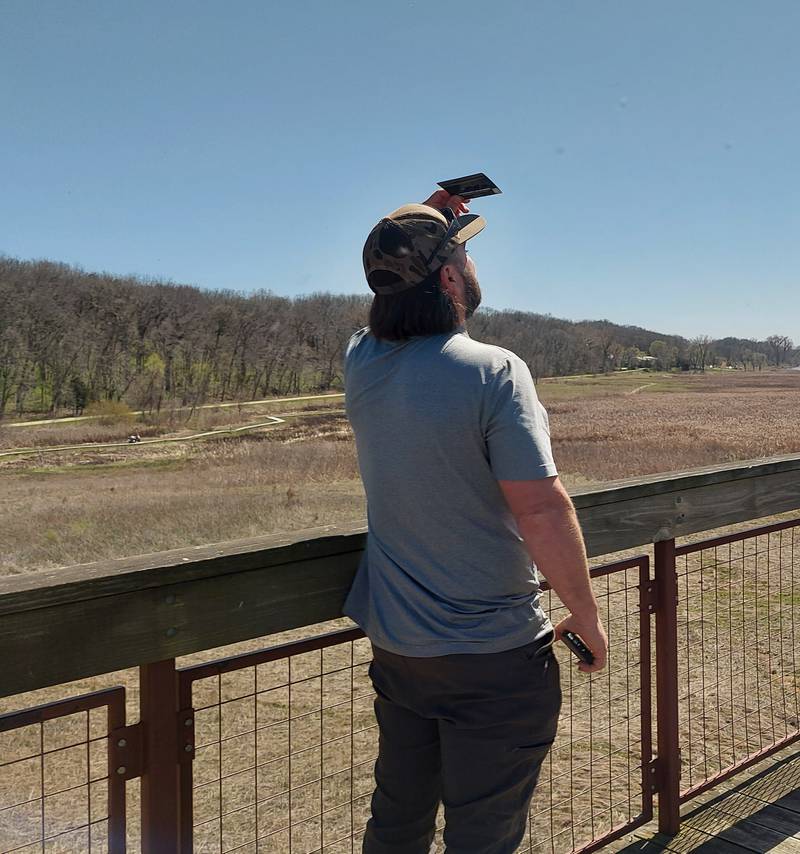 Residents viewed the partial solar eclipse Monday, April 8, 2024, from the top of the tower at the Dixon Waterfowl Refuge outside of Hennepin.