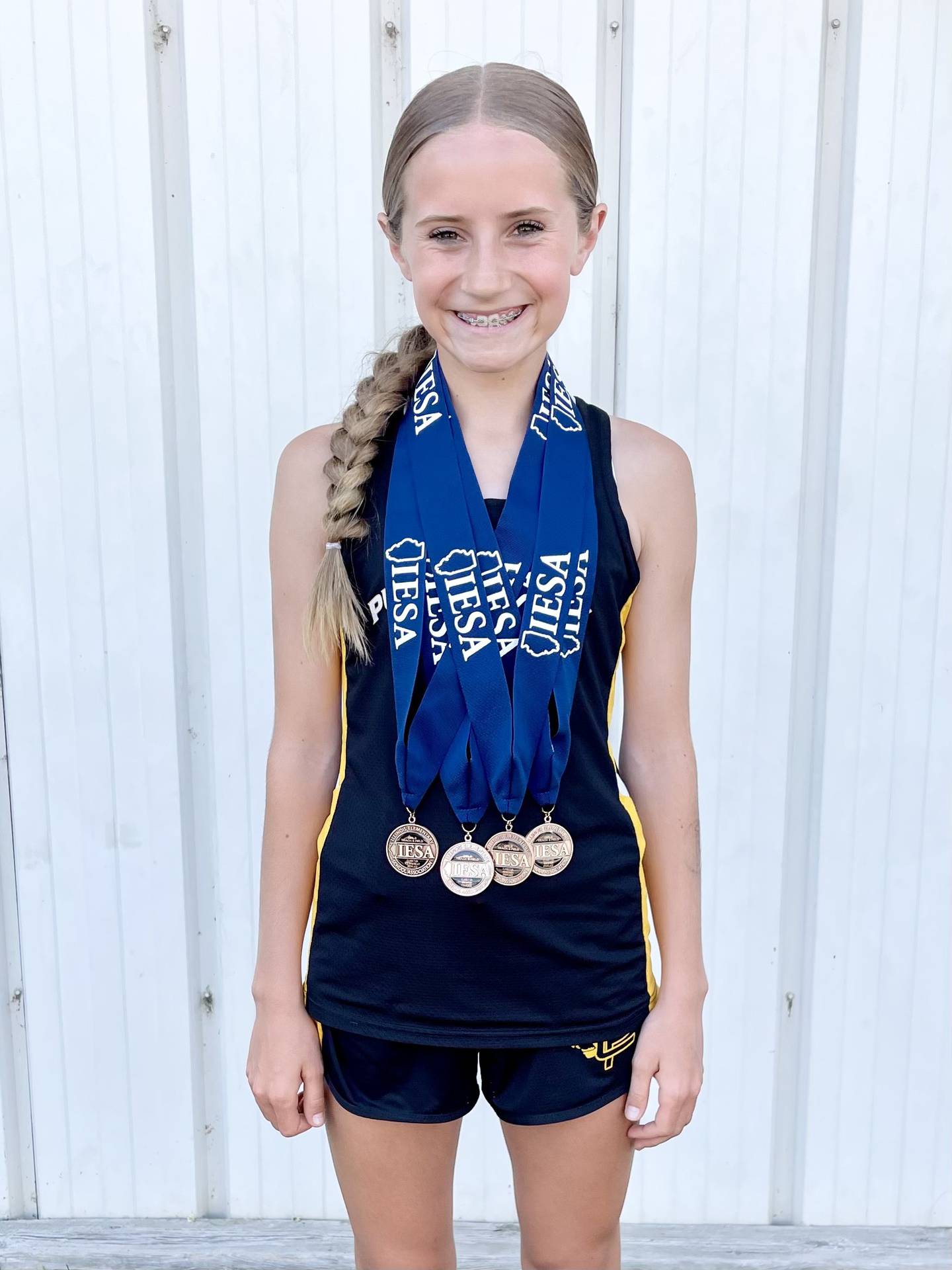 Putnam County's Anni Judd won four state medals at the IESA State Track & Field Finals in East Peoria. She placed third in the 4x100 relay, sixth in the 1,600, seventh in the 800 and eighth in the 400.