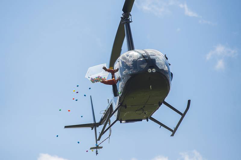 Michael Thomas, a member of Turning Point CITI Church, was one of the lucky ones to get to drop the eggs from the helicopter, Saturday, April 16, 2022. Pilot Jonathan Mabry of JMX Helicopters of Princeton made four passes, then came down for another load of eggs before the eager seekers were allowed to scramble for the treats.