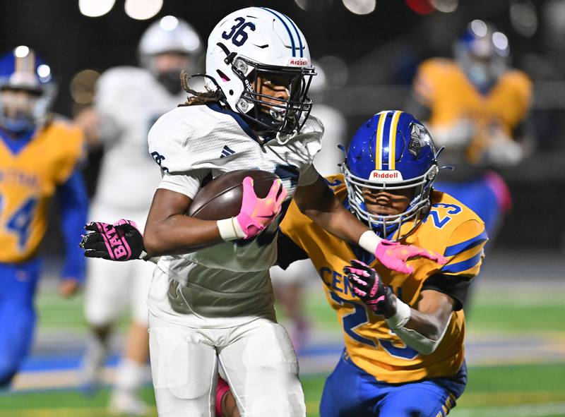 Plainfield South's Kodi Garner (36) runs for a big gain during the conference game against Joliet Central on Friday, OCT. 17, 2025, at Joliet.