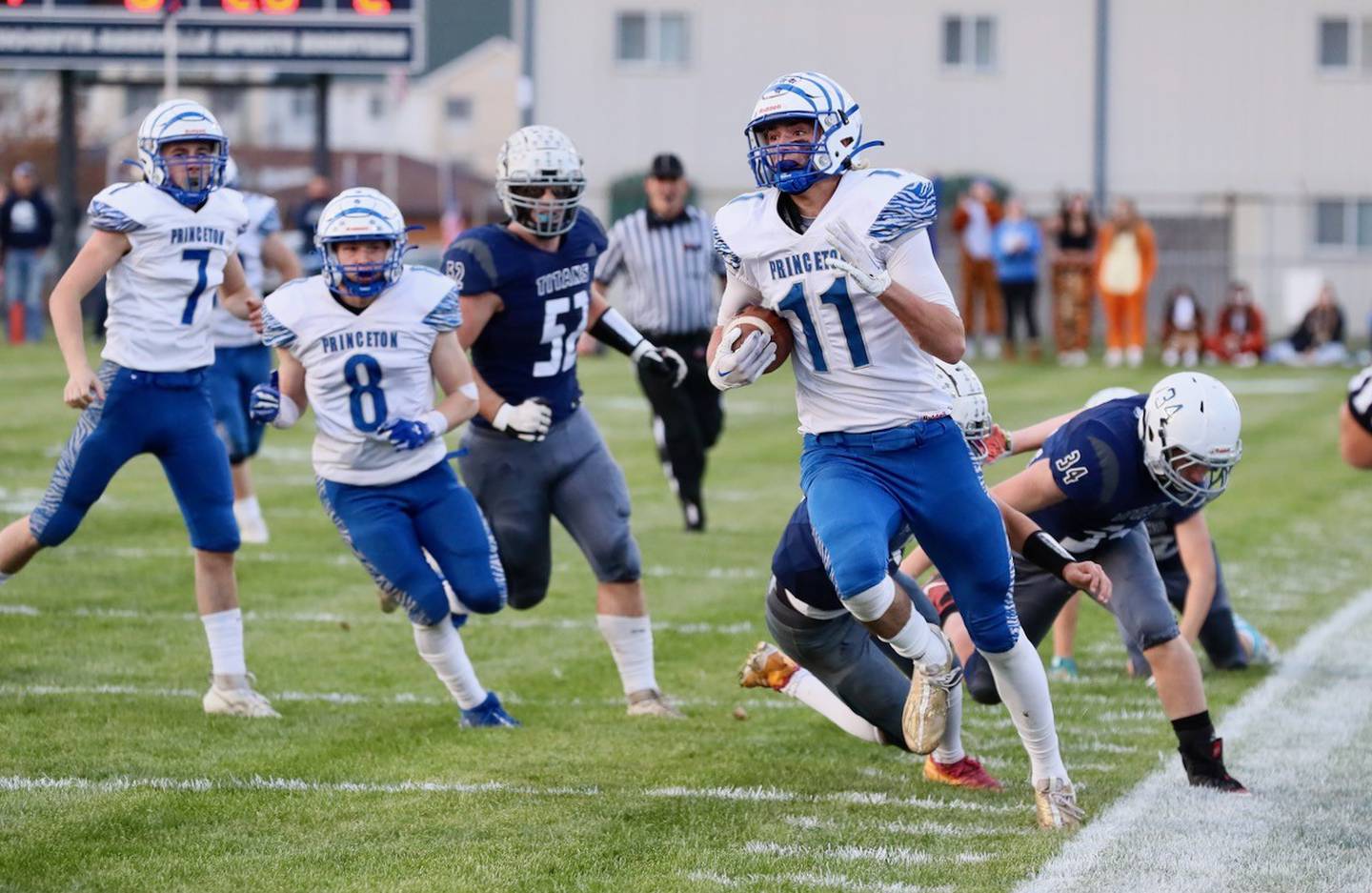 Princeton's Noah LaPorte tip toes the sidelines on a punt return Saturday at Monmouth.