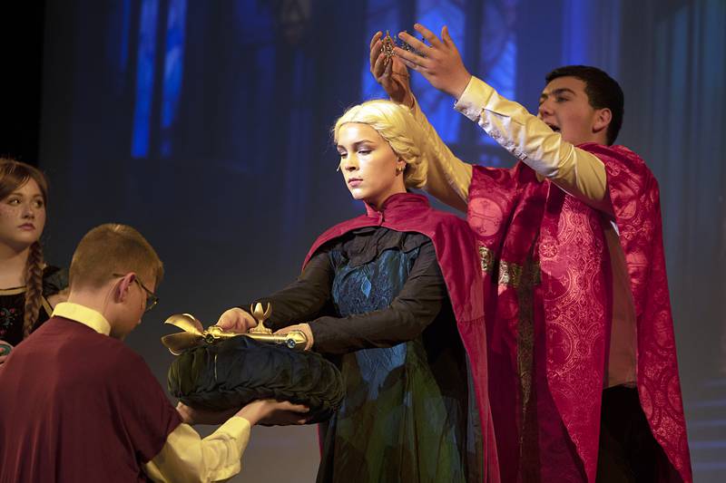 Elise Vander Bleek, playing Elsa, is crowed queen in this scene Wednesday, April 15, 2026, from Newman High School’s rendition of “Frozen.” Show dates will be April 17 and 18 at 7pm and April 19 at 2pm at Centennial Auditorium on the campus of Sterling High School.