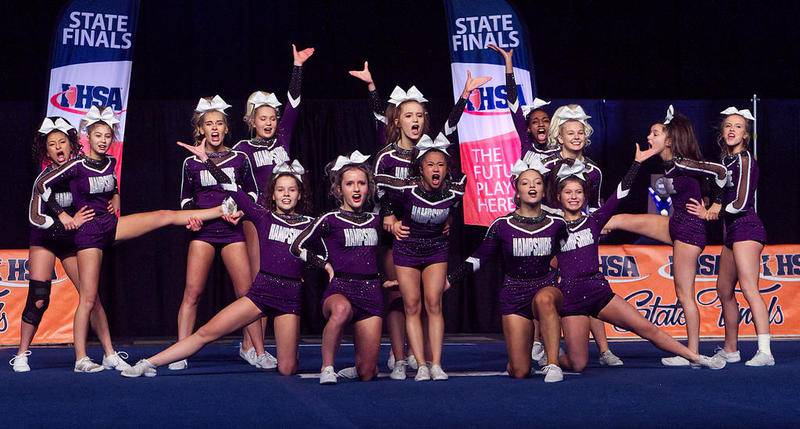 Hampshire competes in the Medium Team Division finals of the IHSA Competitive Cheerleading State Meet on Saturday in Bloomington. The Whip-Purs finished fourth.
