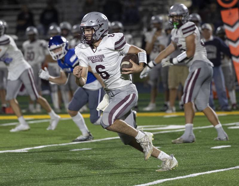 Rockridge’s Cullen Schwingen runs for yards against Newman Friday, Sept. 27, 2024, in Sterling.