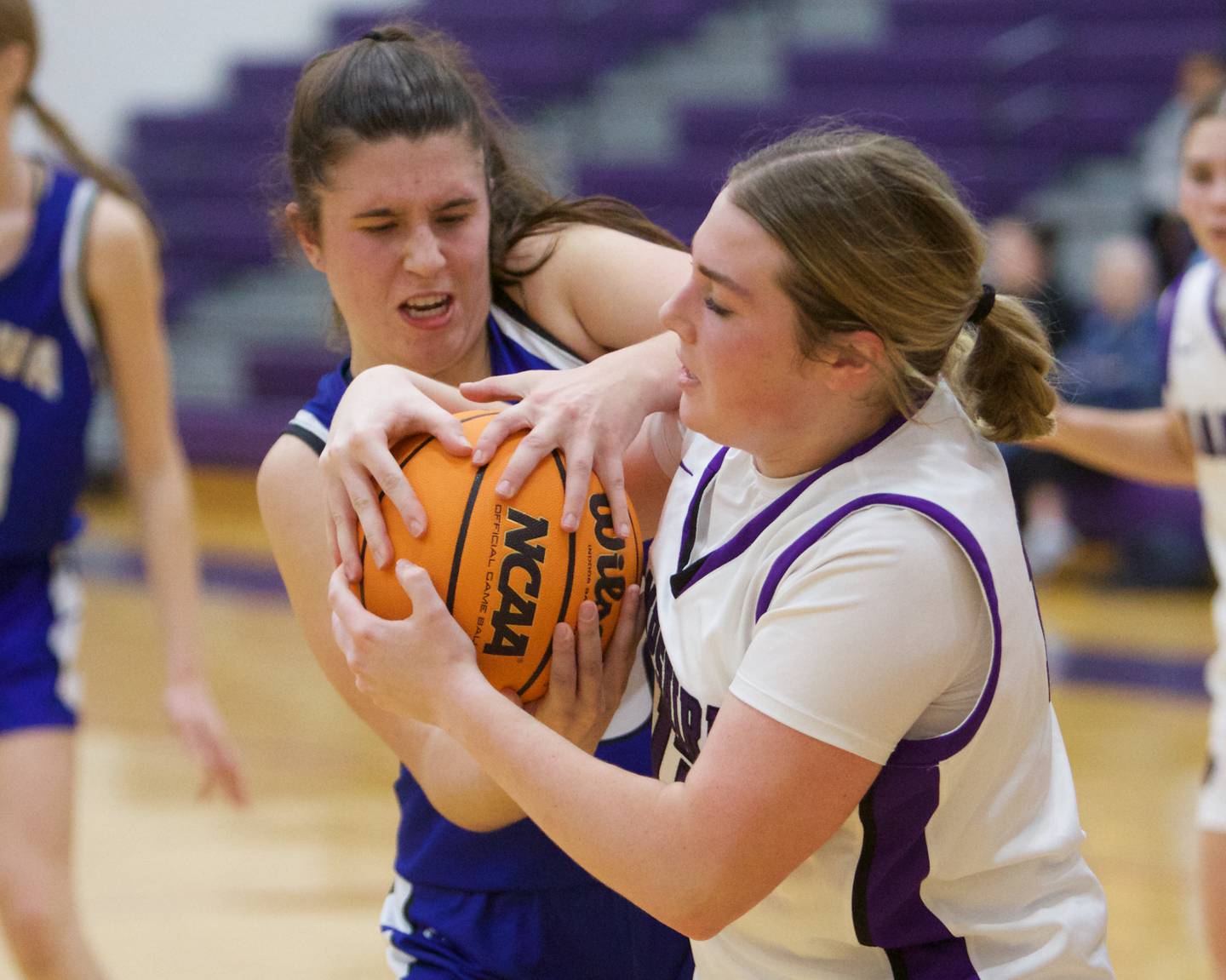 Geneva's Keira McCann battles for the ball with Hampshire's Autumn Kriegel on Friday, Nov.22.2024 in Hampshire.