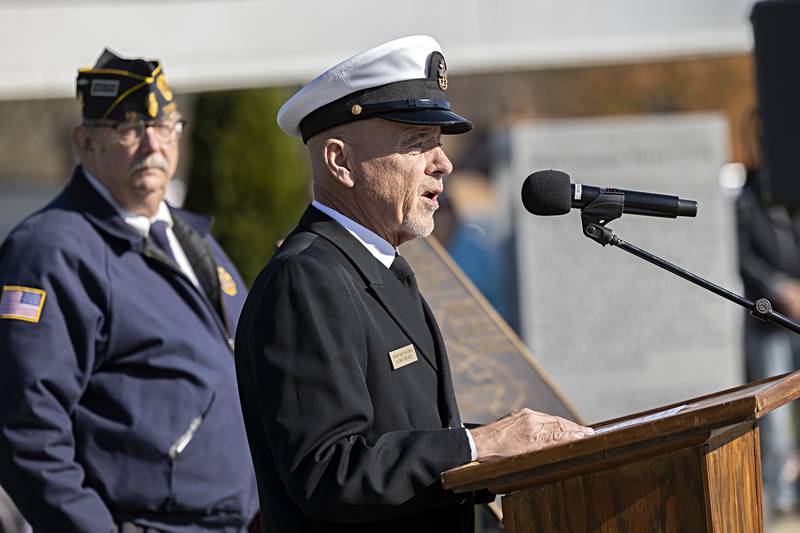 Retired Navy Chief Ron Helfrich takes the podium as the keynote speaker during a Veterans Day ceremony Saturday, Nov. 11, 2023 at the Dixon Veterans Park. Helfrich reminded everyone about the history of Veterans Day and paid a special tribute to the women who served back home while war raged in Europe during WWII.