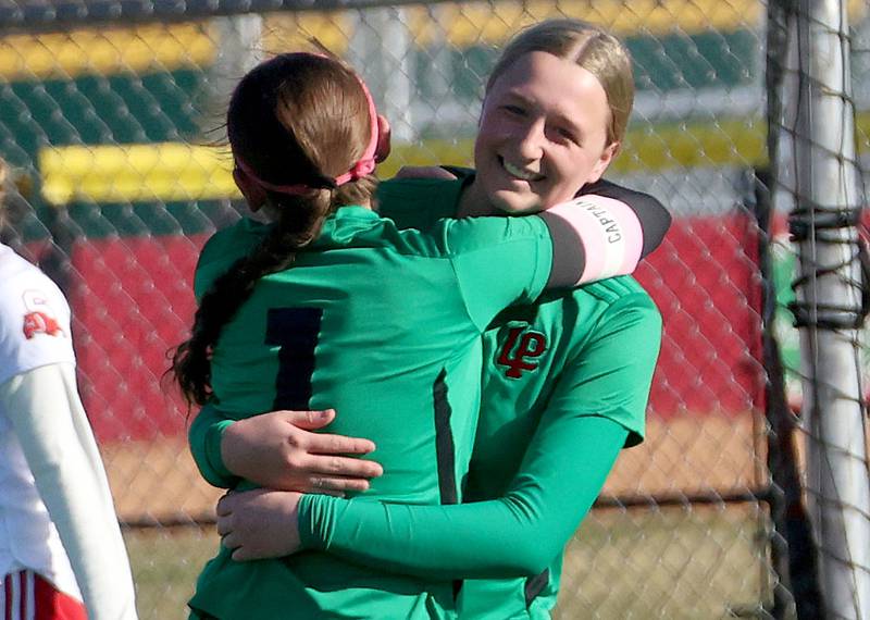 L-P's Addie Dawson hugs teammate Alexus Hines after scoring a goal against Streator on Friday, March 27, 2026 at the L-P athletic complex in La Salle.