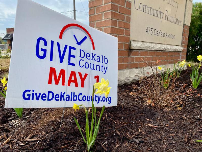 A sign for Give DeKalb County, the 24-hour fundraiser that supports nonprofits across the county, sits outside the DeKalb County Community Foundation building, 475 DeKalb Ave., Sycamore, on Friday, April 25, 2025. The fundraiser is May 1, 2025.