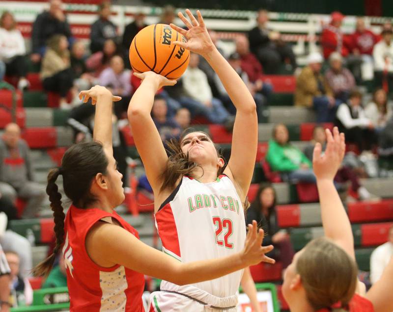L-P's Brianna Ruppert lets go of a shot over Streator's Isabel Gutierrez on Tuesday, Jan. 28, 2025 in Sellett Gymnasium at L-P High School.