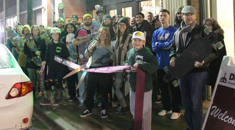 The DeKalb Chamber of Commerce welcoming Fargo Skateboarding with a ribbon cutting.