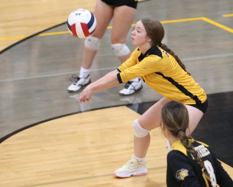 Putnam County's libero Sarah Johnson returns a serve from Marquette on Thursday, Sept 7, 2023 at Putnam County High School.