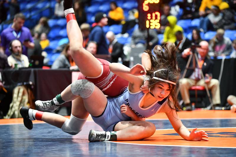 Viola Pianetto of Mt. Prospect and Claudia Heeney of Lockport Township wrestle in the 135-pound championship match in the IHSA Girls Individual State Finals on Saturday, March 1. Heeney took first place over Pianetto.