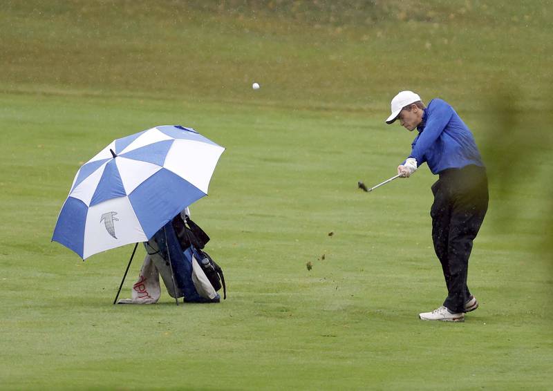 Trey Hubner, Wheaton North, chips to the green during the DuKane Conference Boys Varsity Tournament Tuesday, Sept. 24, 2024 Bartlett Hills Golf Club.