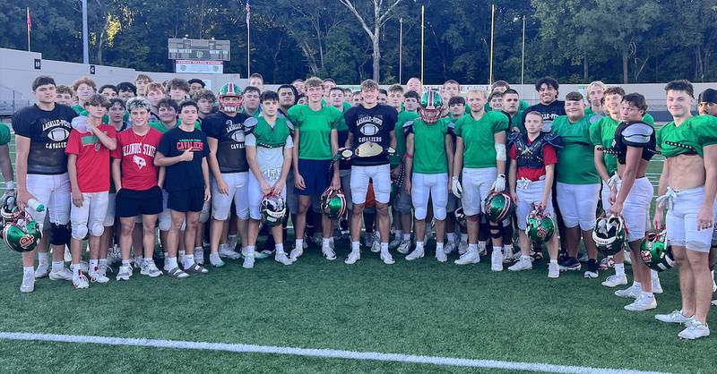 La Salle-Peru senior defensive back Regan Doerr (center) was voted Friday Night Drive Team of the Week MVP after recording eight tackles, three pass breakups and two interceptions in a 28-14 win over Ottawa.