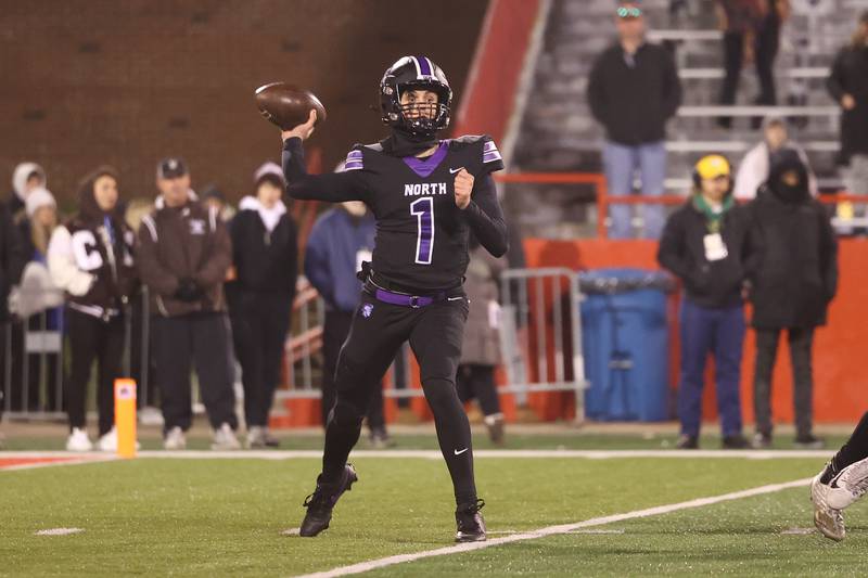 Downers Grove North’s Owen Lansu passes against Mt. Carmel in the Class 7A championship on Saturday, Nov. 25, 2023 at Hancock Stadium in Normal.