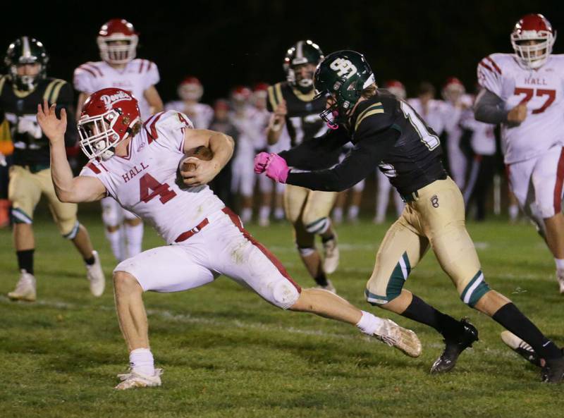 Hall's Mac Resetich (4) sprints down the field as he is being chased by St. Bede's Ben Wallace (13) on Saturday, Oct. 15, 2022 at the Academy in Peru.