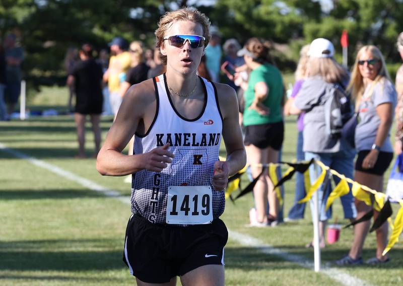 Kaneland’s Evan Nosek wins the boys varsity race Tuesday, Sept. 3, 2024, during the Sycamore Cross Country Invite at Kishwaukee College in Malta.