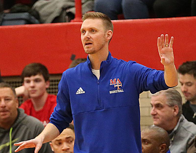 Marmion head boys basketball coach Joe Piekarz coaches his team against Metamora during the Class 3A Super-Sectional on Monday, March 6, 2023 at Ottawa High School.