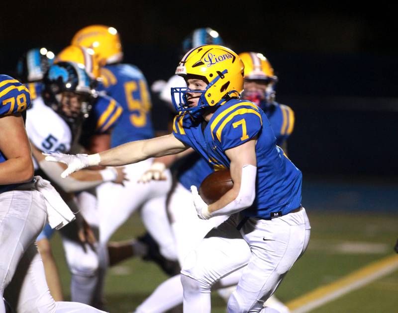 Lyons Township’s Danny Carroll carries the ball during the Class 8A second-round game against Downers Grove South on Friday, Nov. 8, 2024 at Lyons Township in Western Springs.