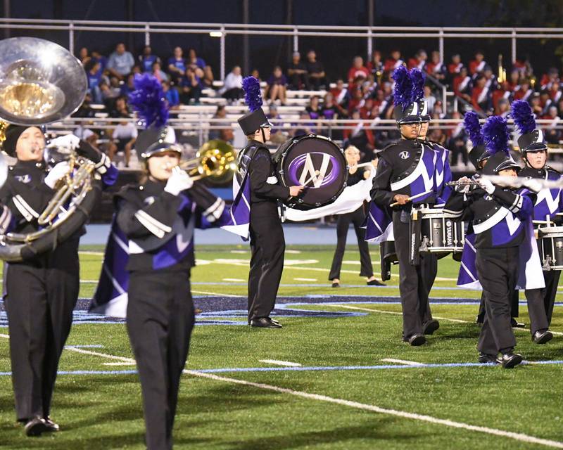 Downers Grove North marching band performs during the Downers Grove South Marching Mustangs Music Bowl on Saturday Oct. 5, 2024, held at Downers Grove South.