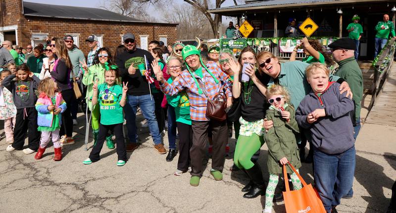 Parade goers enjoy the Irish Parade in Yorkville on Saturday, March 15, 2024.