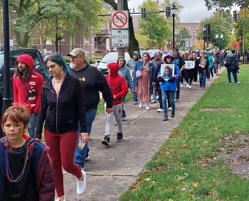 Hundreds of walkers participated in the Out of the Darkness Walk on Saturday, Oct. 14, 2023, at Washington Square in Ottawa.