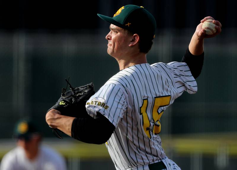 Crystal Lake South's Yandel Ramirez throws a pitch during a Fox Valley Conference baseball game against McHenry on Monday, April 13, 2026, at Crystal Lake South High School.